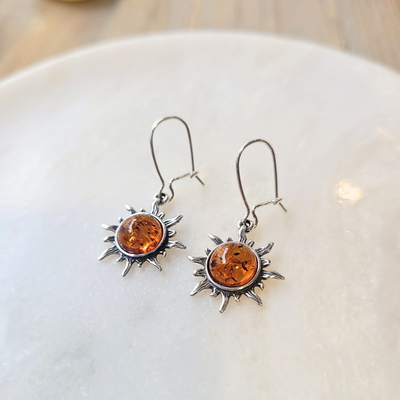 Boucles soleil en ambre sur argent