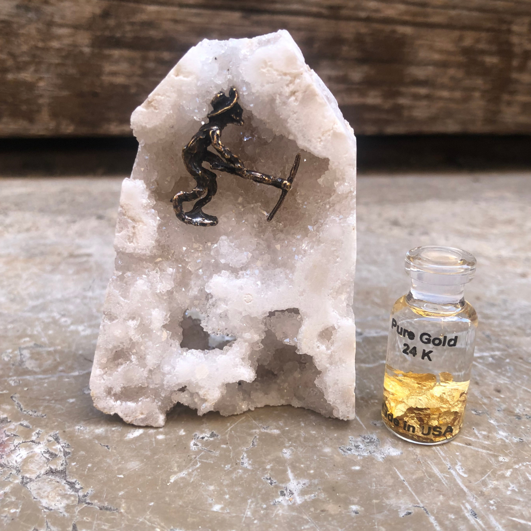 Chercheur d'or et fiole d'or