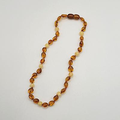 Collier Ambre Bébé Perles Miel bicouleur
